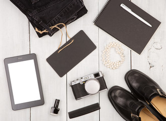 shoes, jeans, tablet pc, camera, notepad, essentials and tag