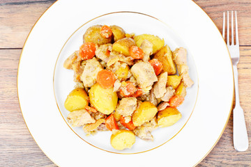 Stewed Quince with Potatoes, Carrots, Onions and Meat