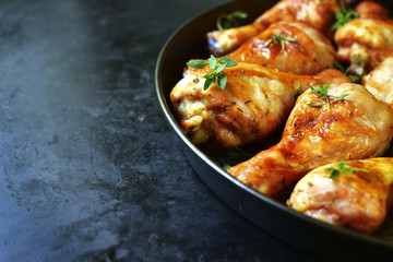 Grilled chicken legs with thyme.