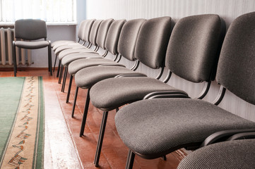 Interior room with chairs in a row
