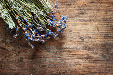 Lavander flowers on wooden background