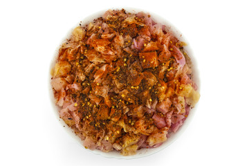 Pickled cabbages salad with powdered pepper in a bowl, Sour cabbages salad and ground paprika