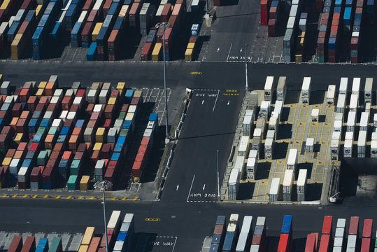 Aerial view of rows multi colored stacked cargo containers, Port Melbourne, Melbourne, Victoria, Australia