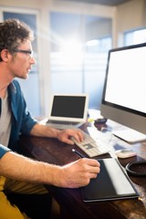 Businessman using a graphic pad