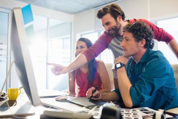 Colleagues using a graphic pad