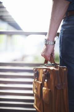 Businessman carrying briefcase