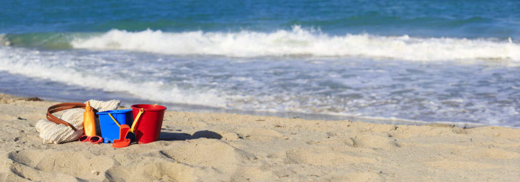 Bag, Suncream, Kids Toys On The Beach