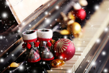 Piano keys decorated and Christmas decorations with snow effect