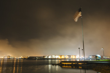 American flag on waterfront of Puget Sound at night, Tacoma, Washington State, USA