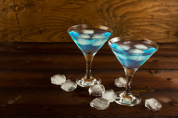 Blue Curacao liqueur served in Martini glass