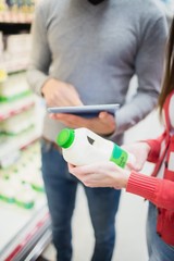 Close up of couple doing grocery shopping together