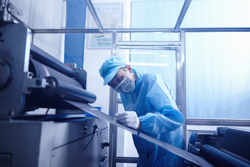 Worker at e-cigarettes battery factory, Guangdong, China