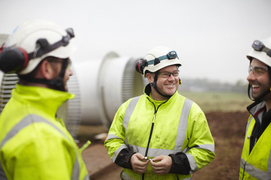Engineers having conversation at wind farm