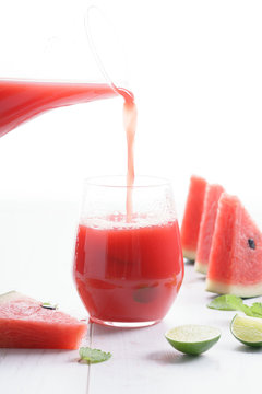 Healthy watermelon drink pouring