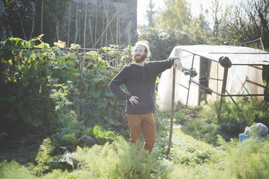 Young man in garden, portrait