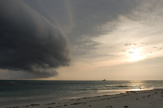 Storm clouds forming on coast of Perez Island at sunset, Gulf of Mexico