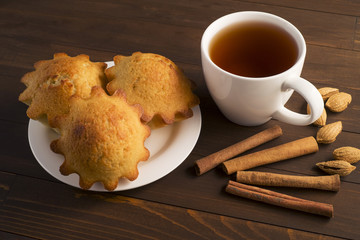 Sweet lush cupcake with tea