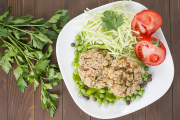 Oat Patty with vegetables, cabbage, tomato and peas