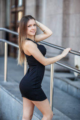 Young woman in a sexy short dress