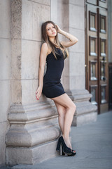 Young woman in a sexy short dress