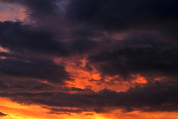 Fototapeta premium Dramatic storm clouds. Sunset