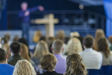 Business Conference Concept and Ideas. Lecturer Speaking In front of the Audience
