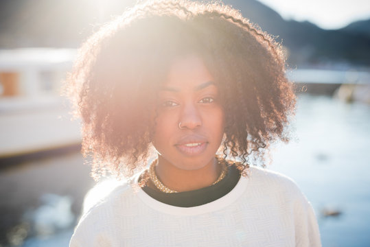 Close up portrait of young woman, Lake Como, Italy