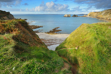View of an ocean lagoon with a climbing rope at Pointe de Toulinguet in Brittany, France