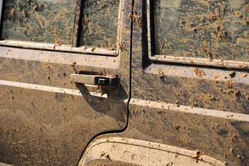 close up on dirty vehicle full of dirt