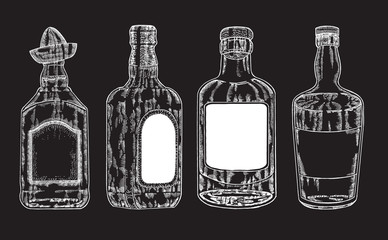 Vector bottles with strong alcohol. Hand drawn whiskey 