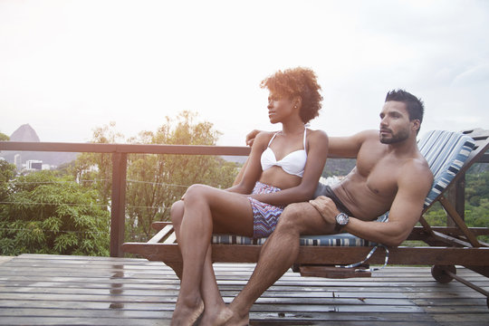 Couple enjoying swimming pool