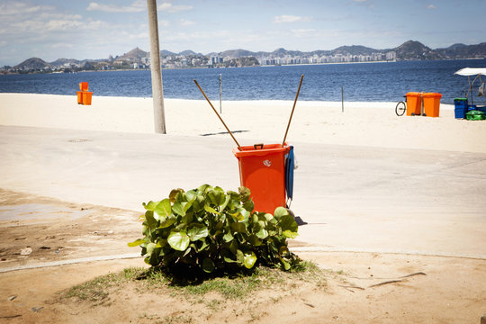 Wheelie bin on beach, Rio de Janeiro, Brazil