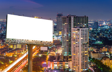 Blank billboard for advertisement in city downtown at night