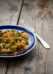 Fresh healthy salad on the rustic wooden table