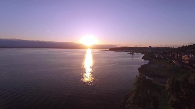 Aerial of Sunset on Puget Sound and Myrtle Edwards Park in Downtown Seattle