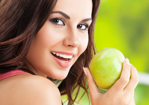  Smiling Woman With Green Apple