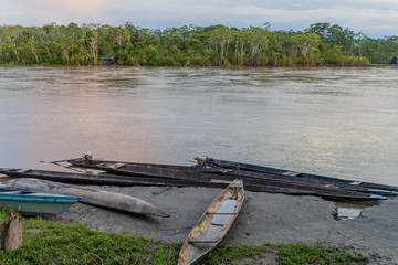 Fototapeta na wymiar Dugout canoe called Peke Peke on a river Napo, Peru