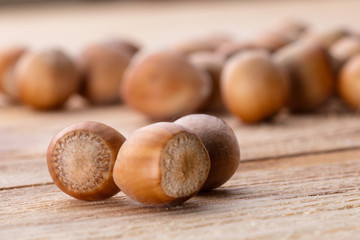 Hazelnuts on brown wooden table