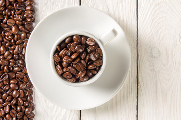 coffee beans in a cup on the table
