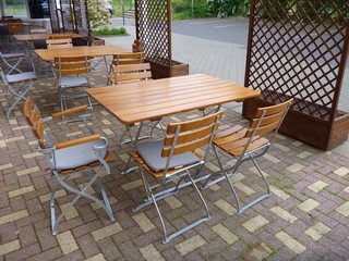 wooedn garden furniture on a terrace