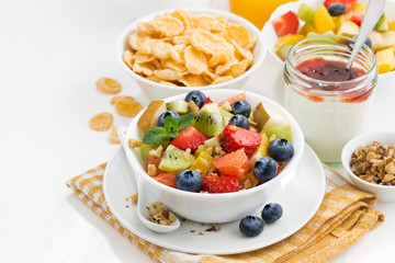 breakfast with fruit salad and corn flakes