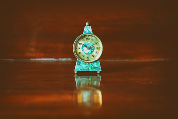 old Clock on a wooden
