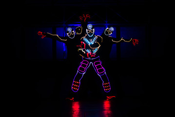 Naklejka na ściany i meble dance team in costumes of the LEDs