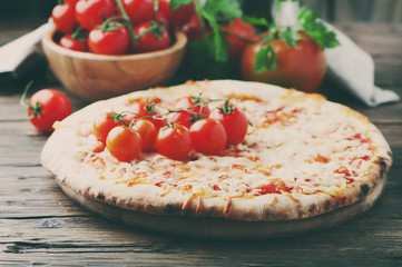 Homemade Italian pizza margherita with tomato