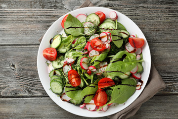 salad with leaf vegetables and tomatoes