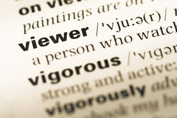 Obraz premium Close up of old English dictionary page with word viewer