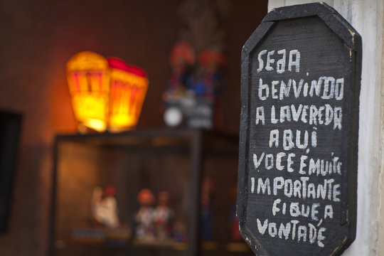 Sign Welcoming Customers, Outside Shop, Close-up