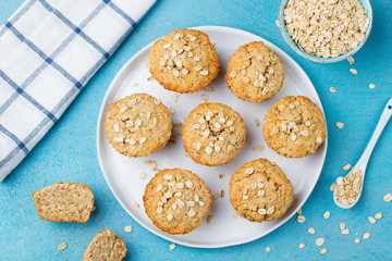 Healthy vegan oat muffins, apple and banana cakes on a white plate Top view