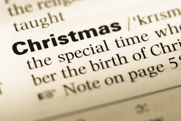 Close up of old English dictionary page with word Christmas