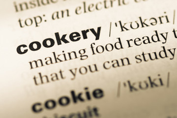Close up of old English dictionary page with word cookery